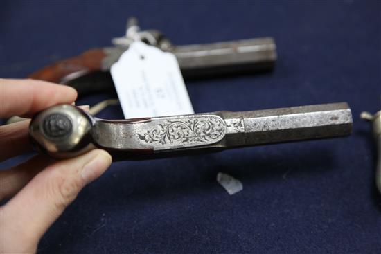 A pair of early 19th century steel boxlock pocket pistols, 6in.